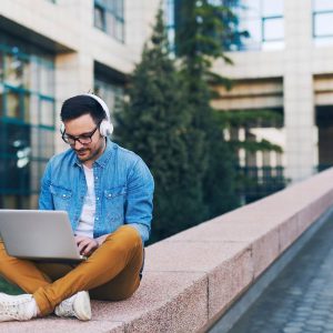 man sitting outside